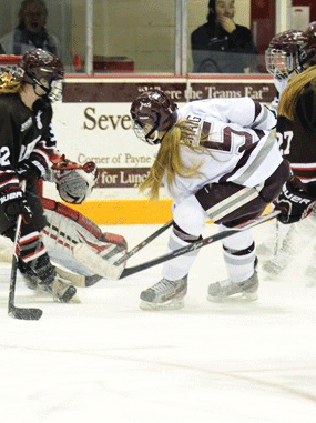CRAIG TAKES A RIP ON NET:Senior forward Taylor Craig fires a shot against Brown Saturday night as the Raiders defeated the Bears in overtime.