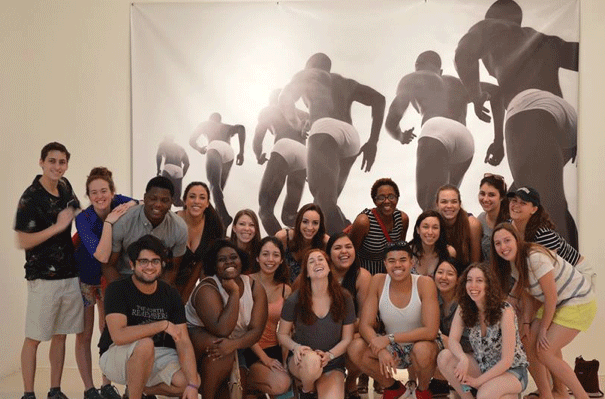 The lively bunch poses in a Jamaican national gallery after studying and living together for a semester. 