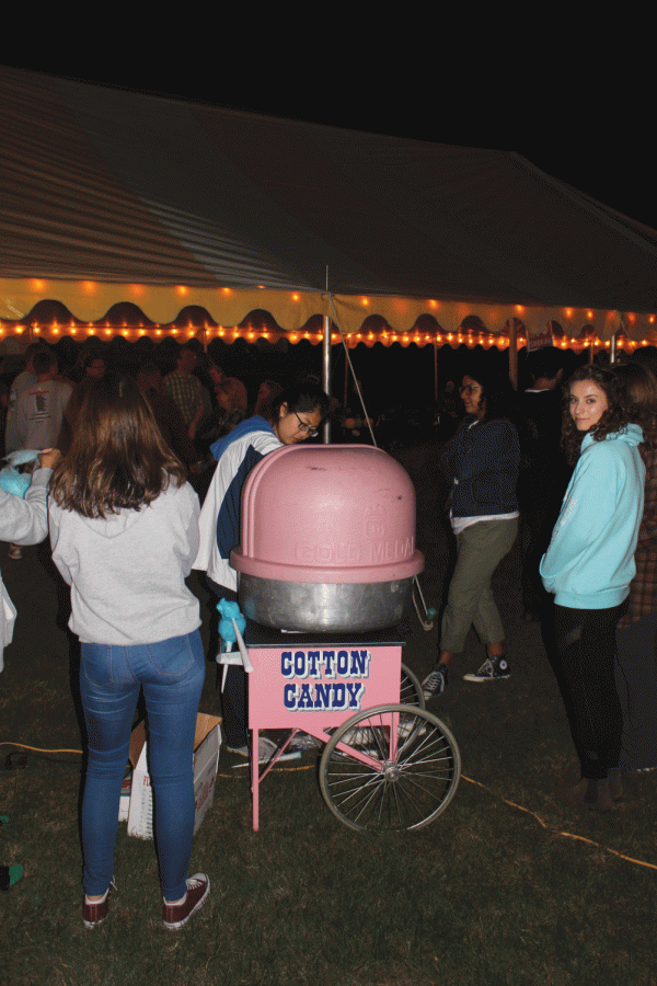 Students enjoy cotton candy at Colgate’s Late Night Country Fair, which was put on by a variety of student organizations.