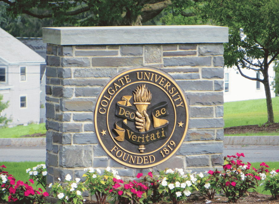 Colgate’s emblem, displayed on this sign, incorporates the currently controversial torch symbol. This year Colgate is rethinking the ceremonial role of the symbol.