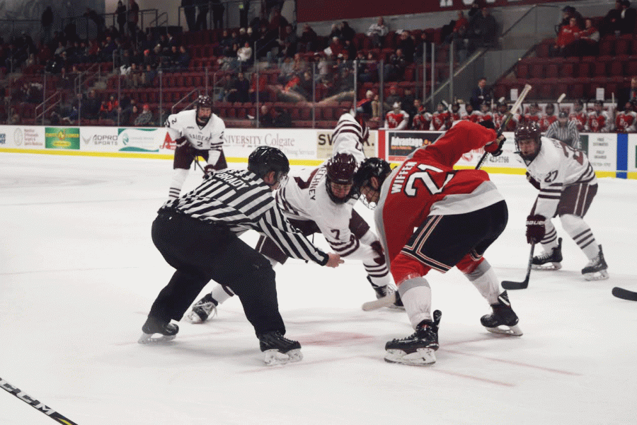 First-year forward Josh McKechney (above) steps up to the faceoff. The team began and ended the game strongly with an early goal in the first period and an open-net goal on a Colgate power-play in the final 30 seconds.  