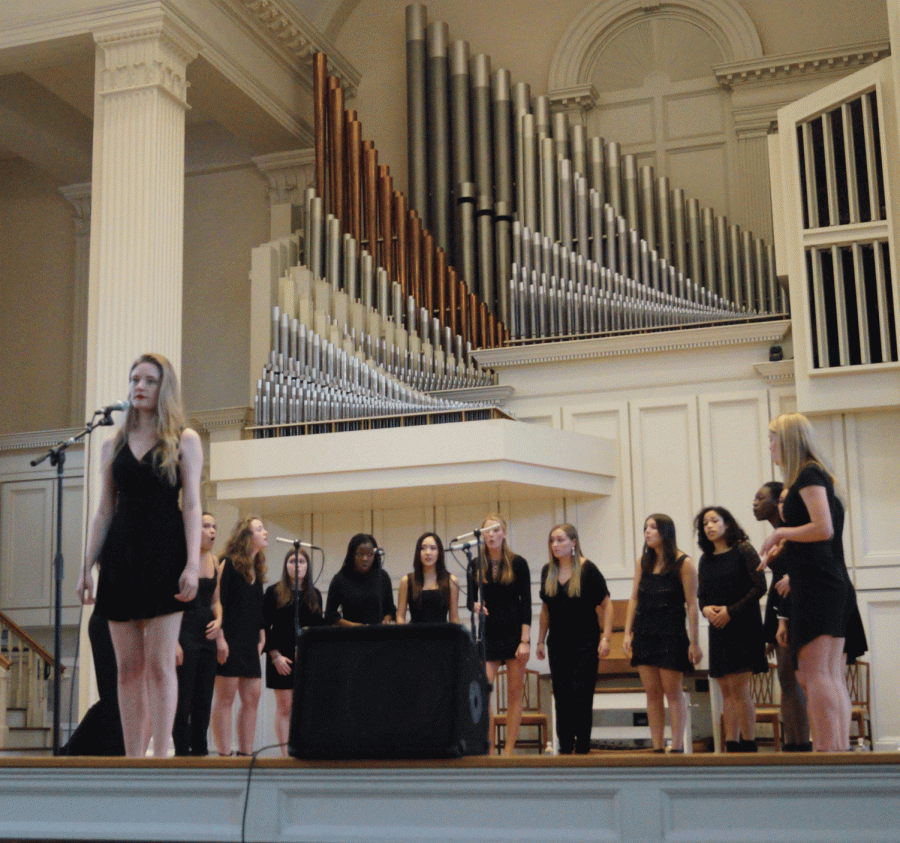 The Swinging Gates’ Julia Feikens takes center stage to perform in the A Cappella Jamboree.