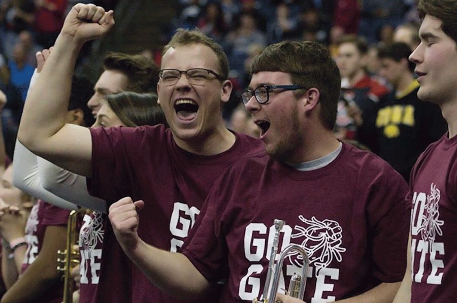 Clad in “Go Gate” t-shirts, Ohio State University students posed as Colgate pep band members at the NCAA Colgate-Tennessee game on Friday, March 22. 