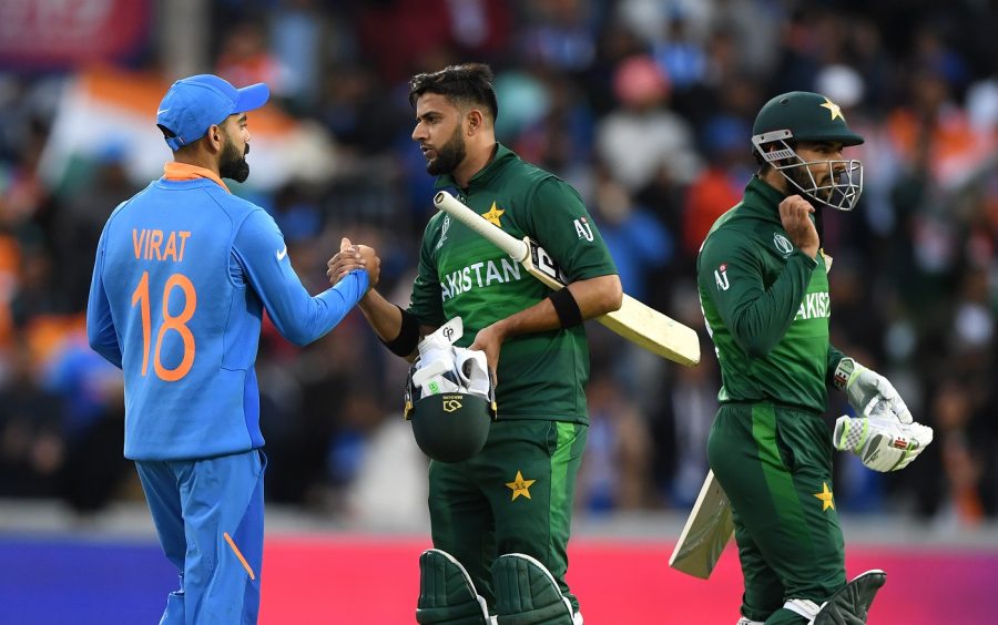 MANCHESTER, ENGLAND - JUNE 16: India captain Virat Kohli shakes hands with Pakistan batsman Imad Wasim after the Group Stage match of the ICC Cricket World Cup 2019 between India and Pakistan at Old Trafford on June 16, 2019 in Manchester, England. (Photo by Stu Forster-IDI/Stu Forster-IDI)