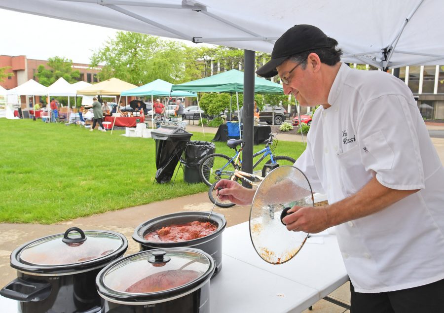 Chef Richard Rossi checks the temperature of his Rossis Meatballs at his stand at the Rome Farmers Market. Rossi is frrom Canastota and will be here every week selling his meatballs.