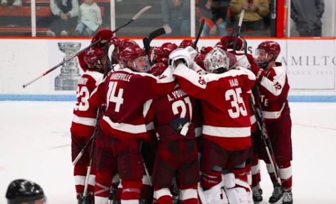 MONEY MITTON: Men’s Hockey celebrates after Junior Ross Mitton’s overtime winner propelled the Raiders to a 4-3 win over Princeton. 
