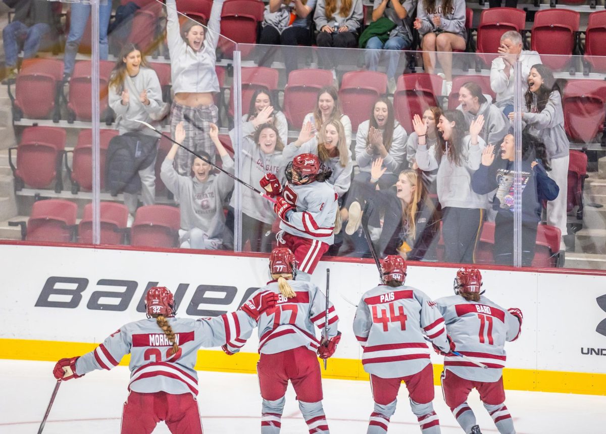 JUMPING+FOR+JOY%3A+Colgate+women%E2%80%99s+hockey+celebrates+after+wining+their+first+game+of+the+season+over+No.+2+Ohio+State.%0A